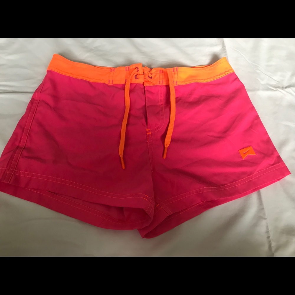 Girls pink and orange Nike shorts
